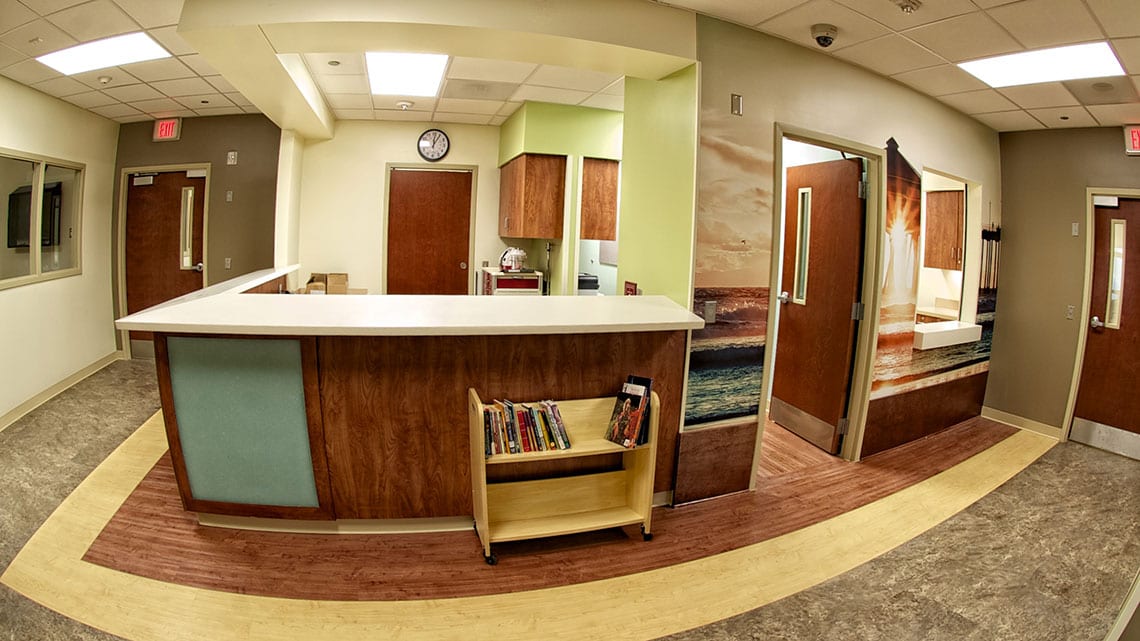 Central nurses station with work area and books