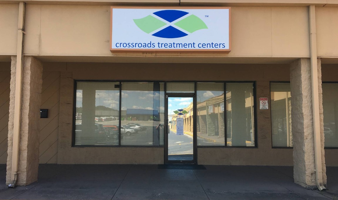 Entrance to Crossroads Treatment Center with front signage