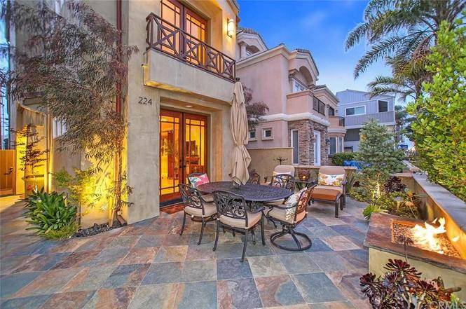 Outdoor seating area with palm trees