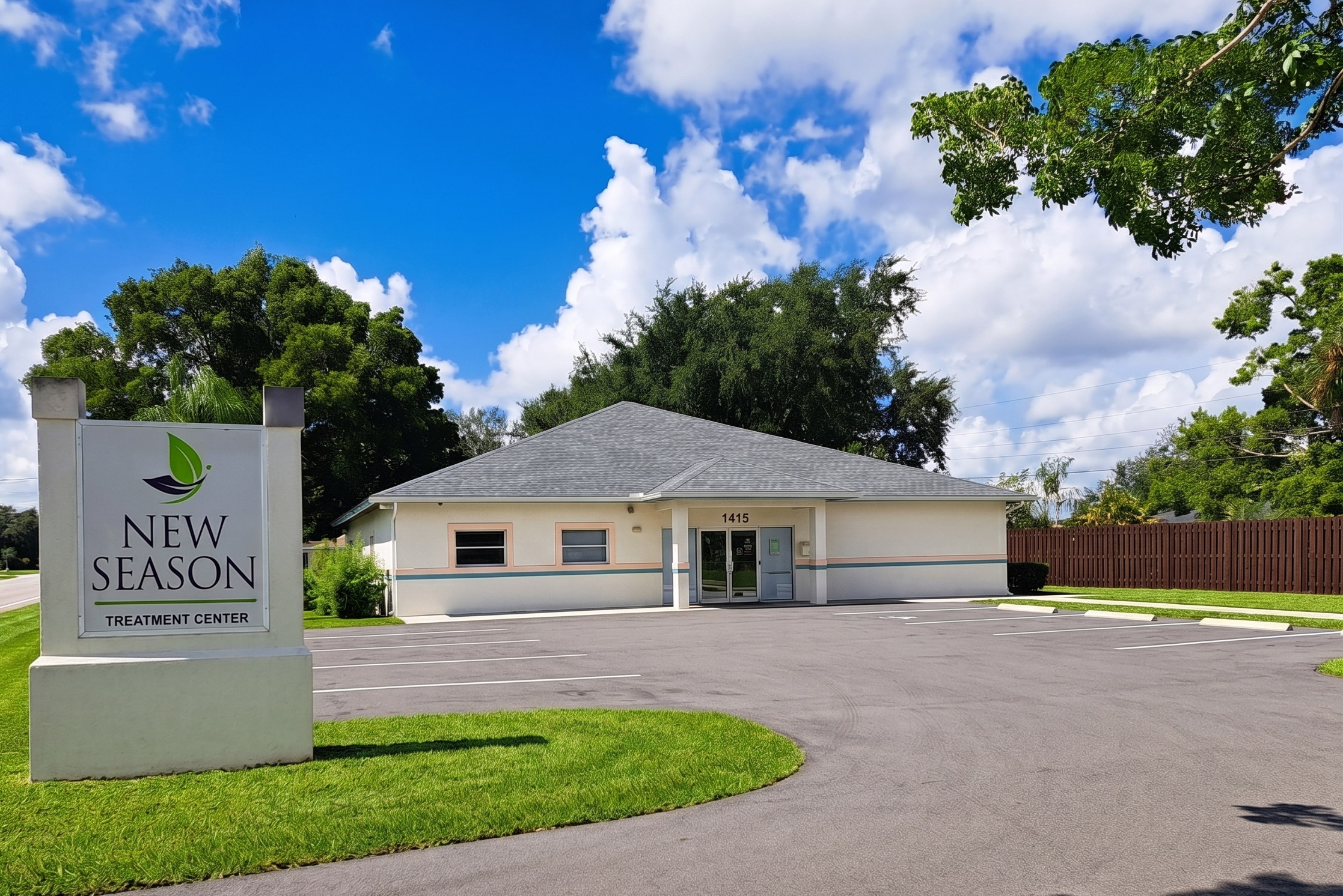 Facility exterior with signage and accessible parking.