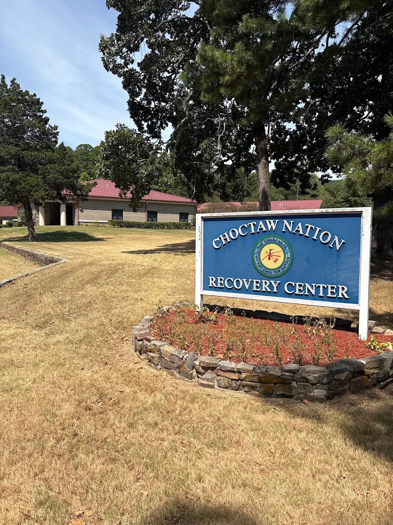 signage and main building and lawn