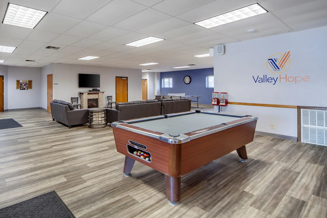 Recreation room with pool table and seating