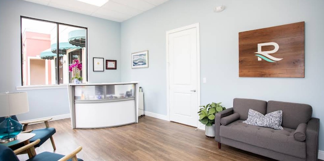 Reception desk and waiting area near facility entrance
