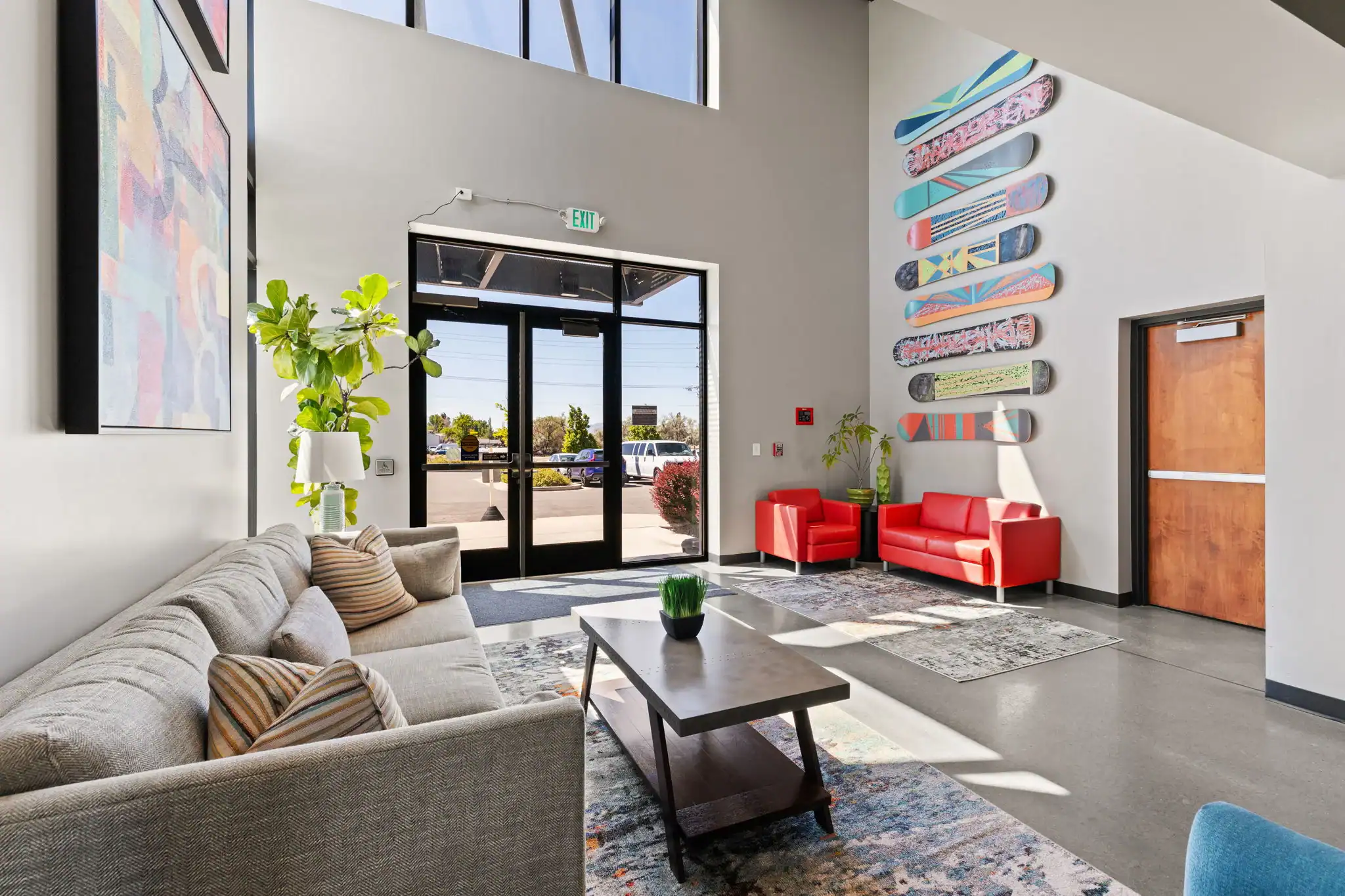 Modern lobby with seating and colorful wall art