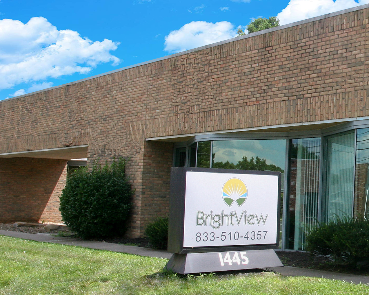 Brick exterior of BrightView Newark with facility sign