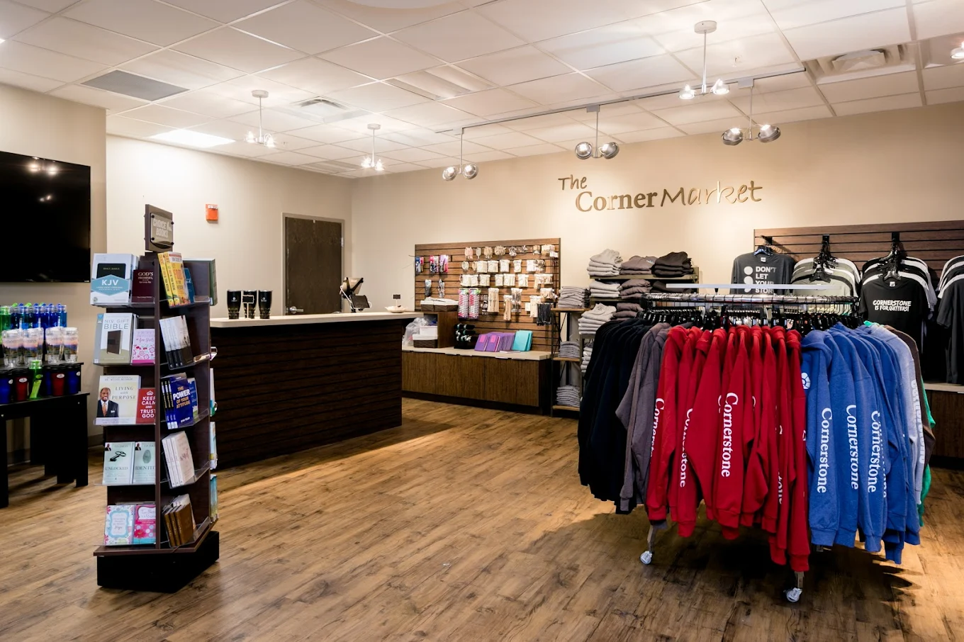 Gift shop with branded clothing, books, and accessories