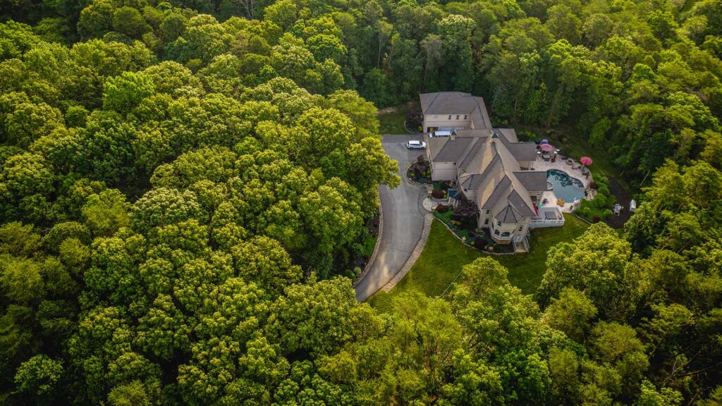 Aerial view of a rehab facility surrounded by woods