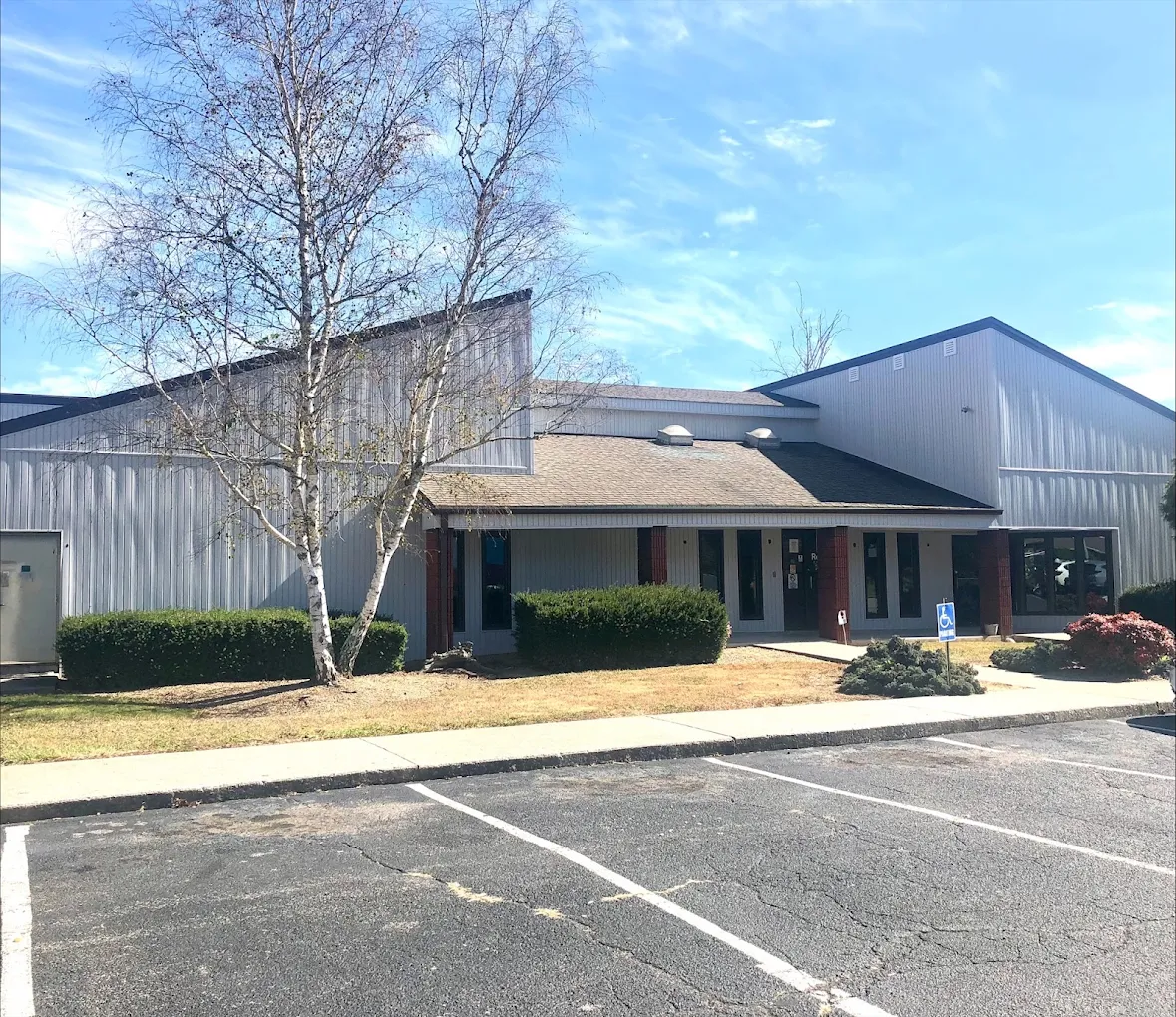 Exterior of recovery center with parking and entrance