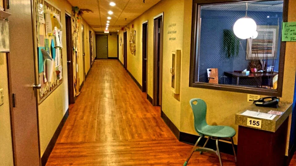 Hallway lined with offices and counseling rooms