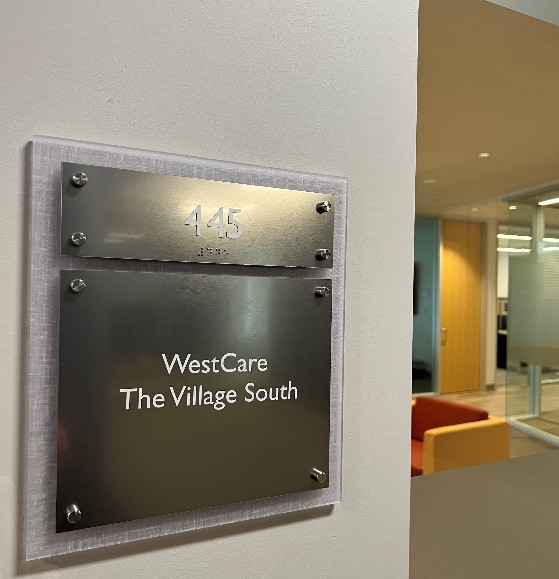 Suite 445 entrance sign at Village South