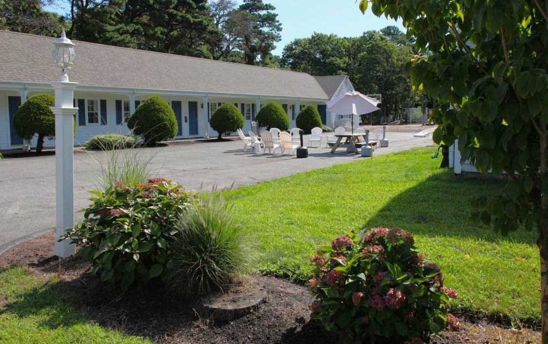 Residential-style rehab facility with landscaped grounds