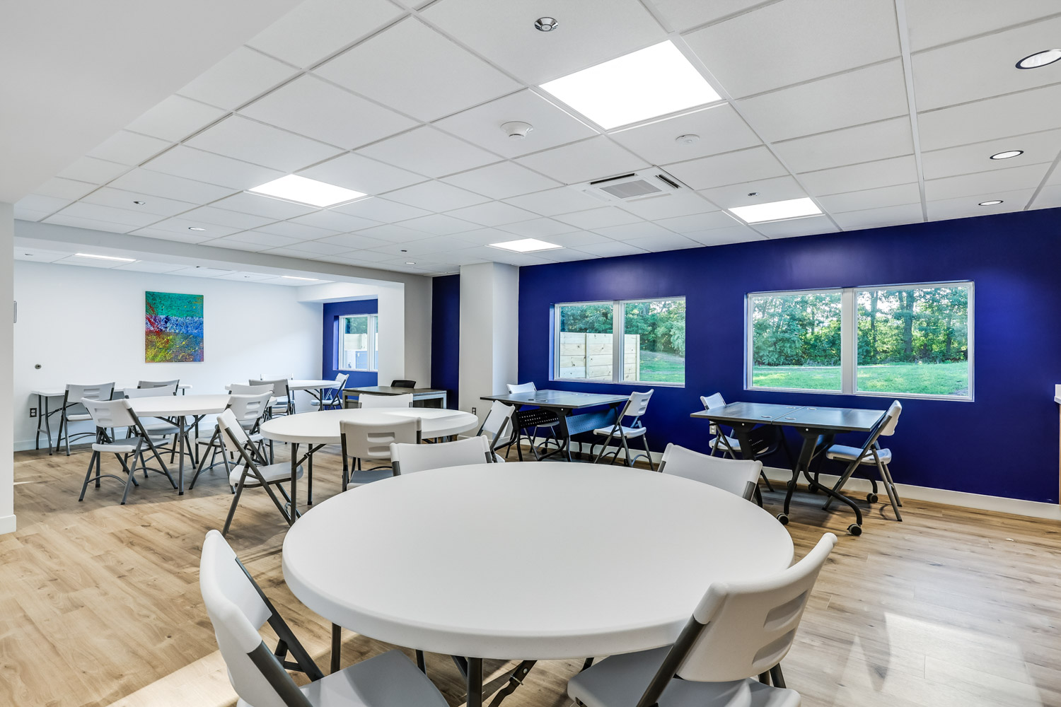 Dining area with tables and bright lighting