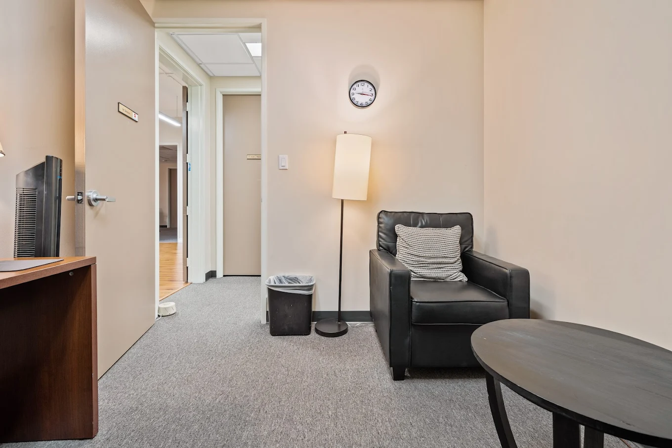 Wellness room with sofa and calming decor