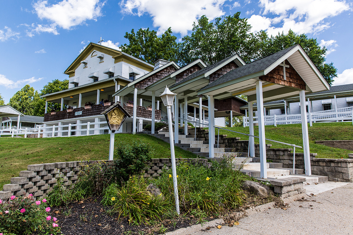 Covered walkway and landscaped entrance to main recovery building