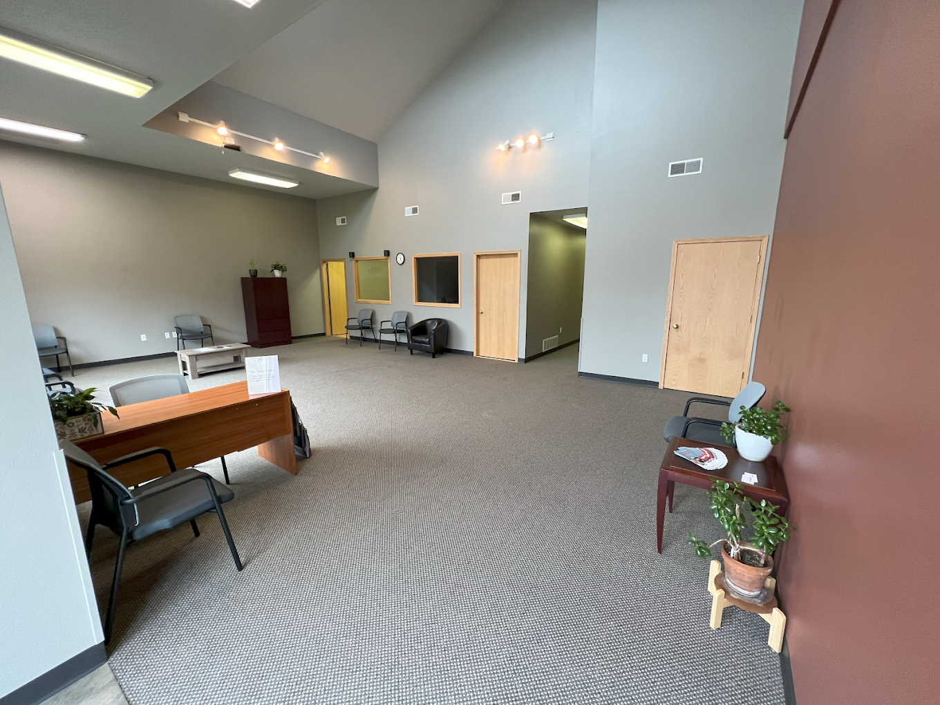 Spacious rehab facility reception with natural light
