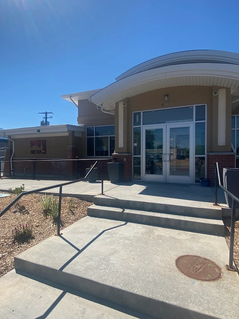 Front entrance of First Step House with glass doors and steps