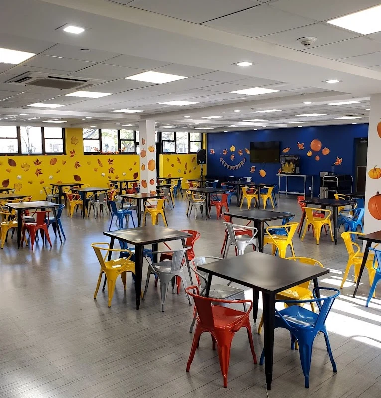 Colorful dining room with tables and chairs