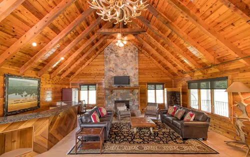 Cozy lodge living room with fireplace and seating