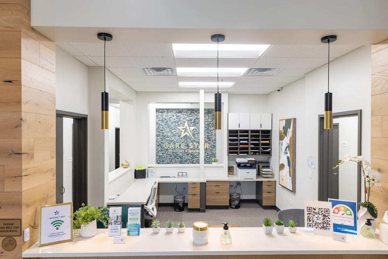 Reception desk with Care Star logo wall