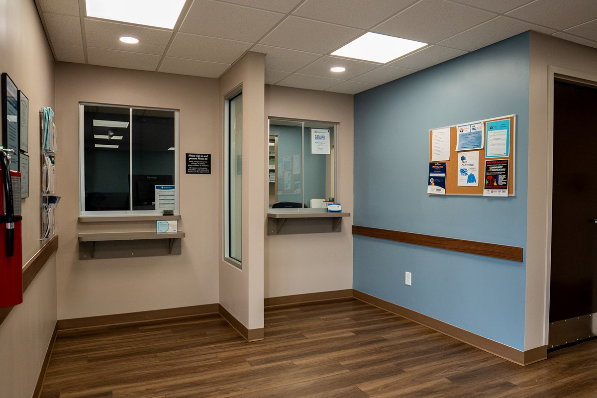 OTP area with service windows and patient information board