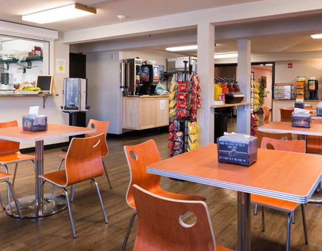 Bright dining space with snack bar and seating