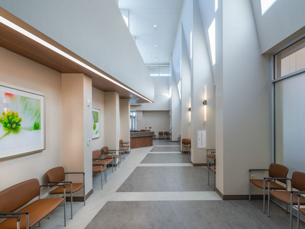 Bright hallway with seating and reception desk