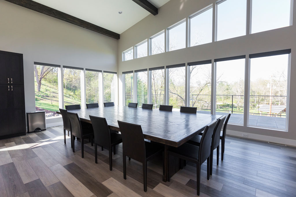 Meeting room with large table and scenic window views