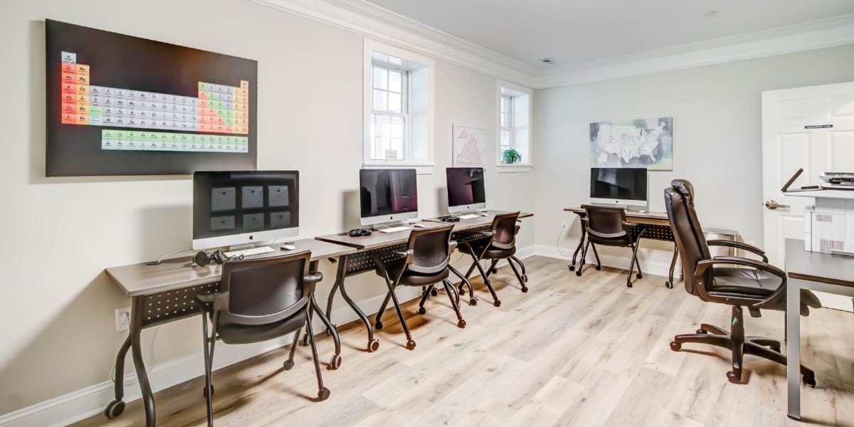 Study room with iMac computers and classroom-style seating