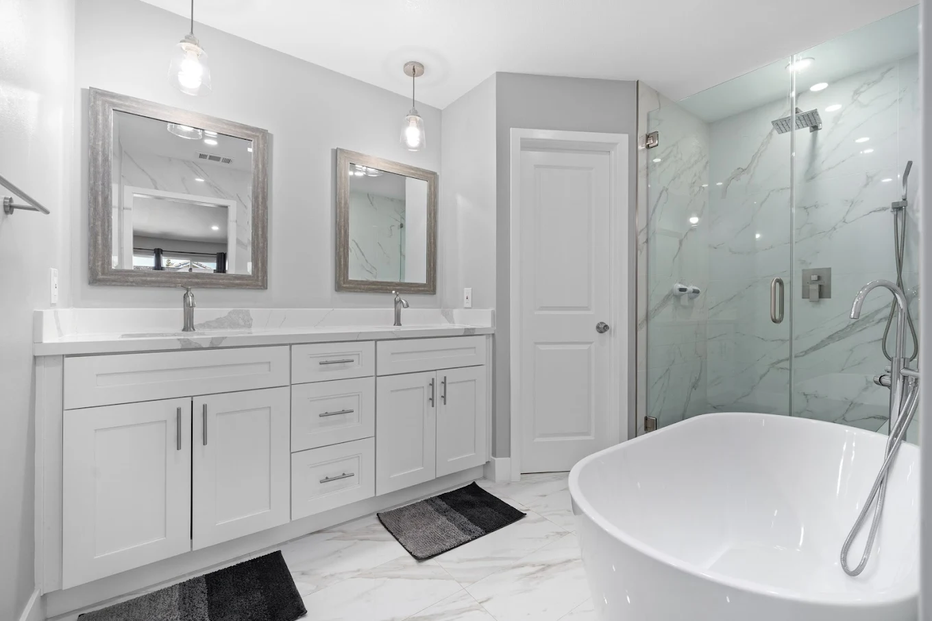 Modern bathroom with glass shower and freestanding tub