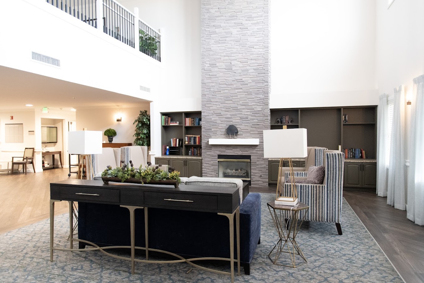 Modern lounge with fireplace and seating area