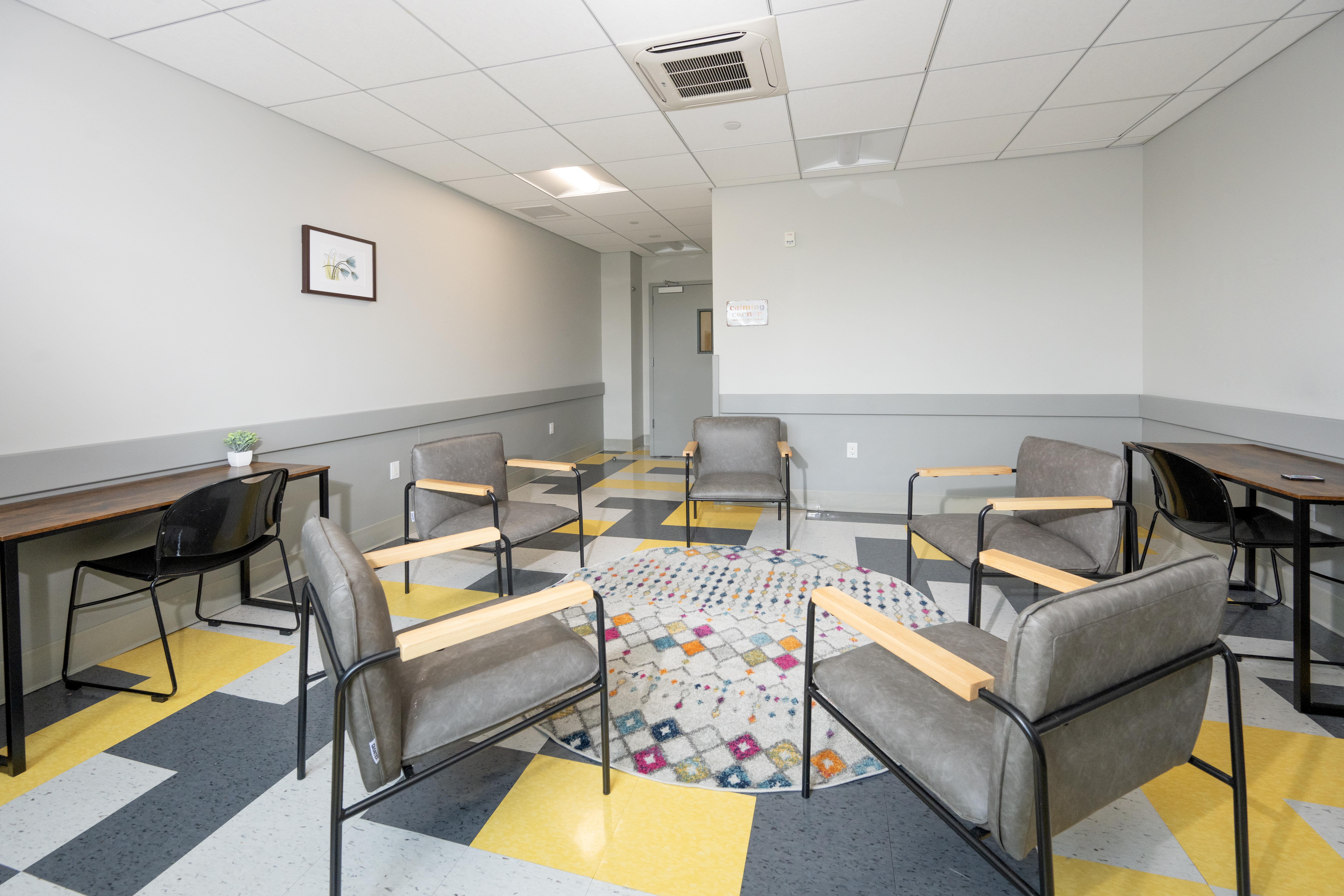 Therapy room with chairs arranged in a circle
