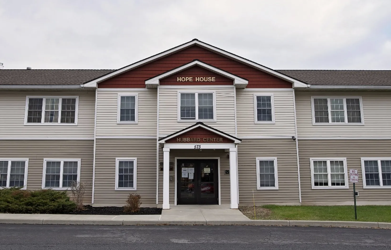 Two-story rehab facility exterior labeled Hope House