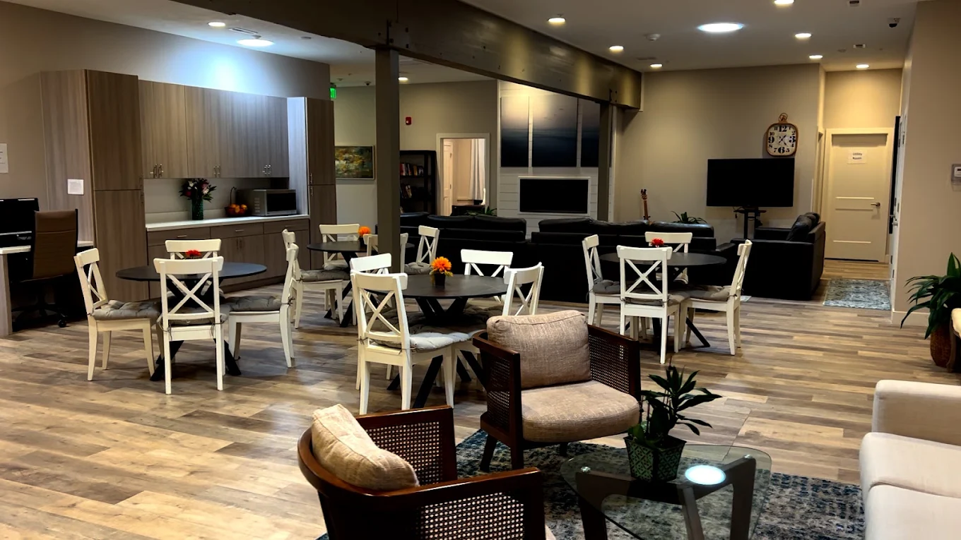 Bright communal dining and living area inside Brighton House