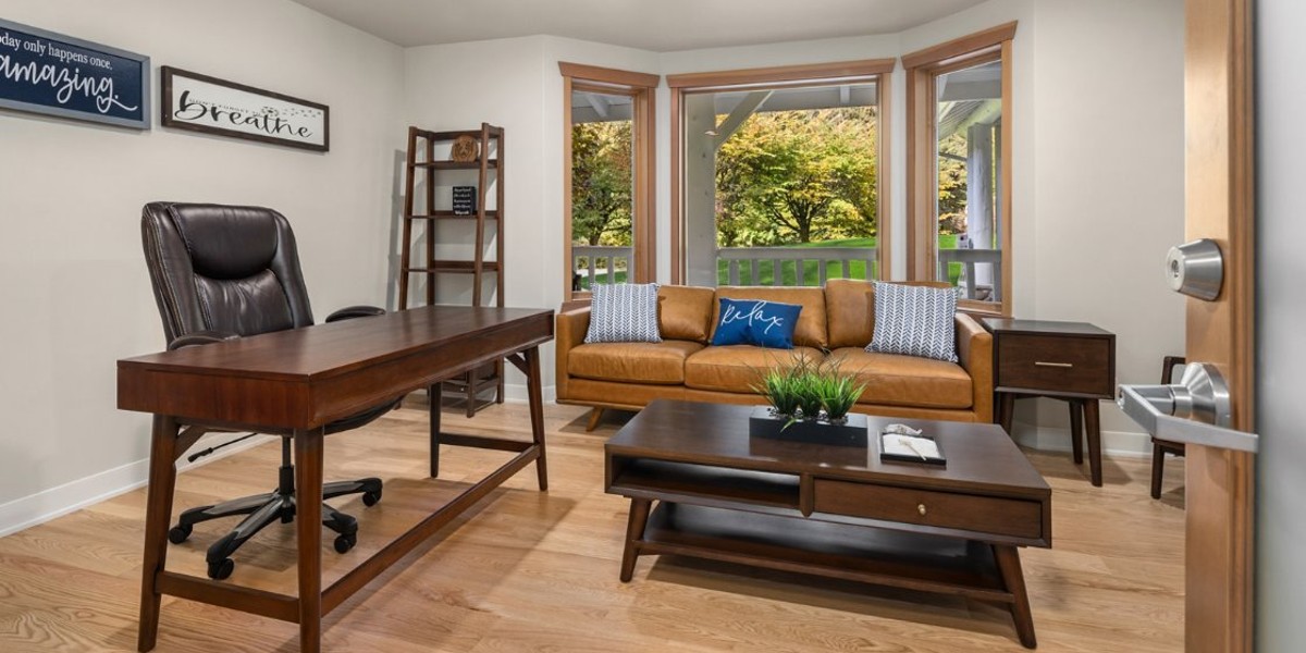 Comfortable counseling office with sofa and desk