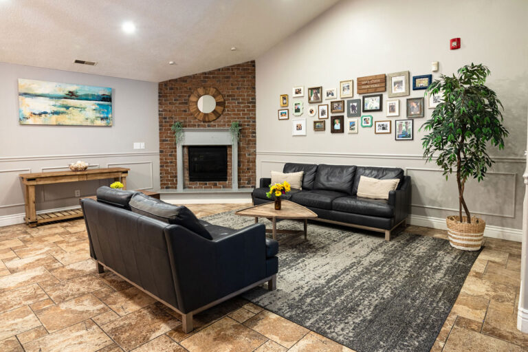 Common living area with fireplace at Ascend Recovery