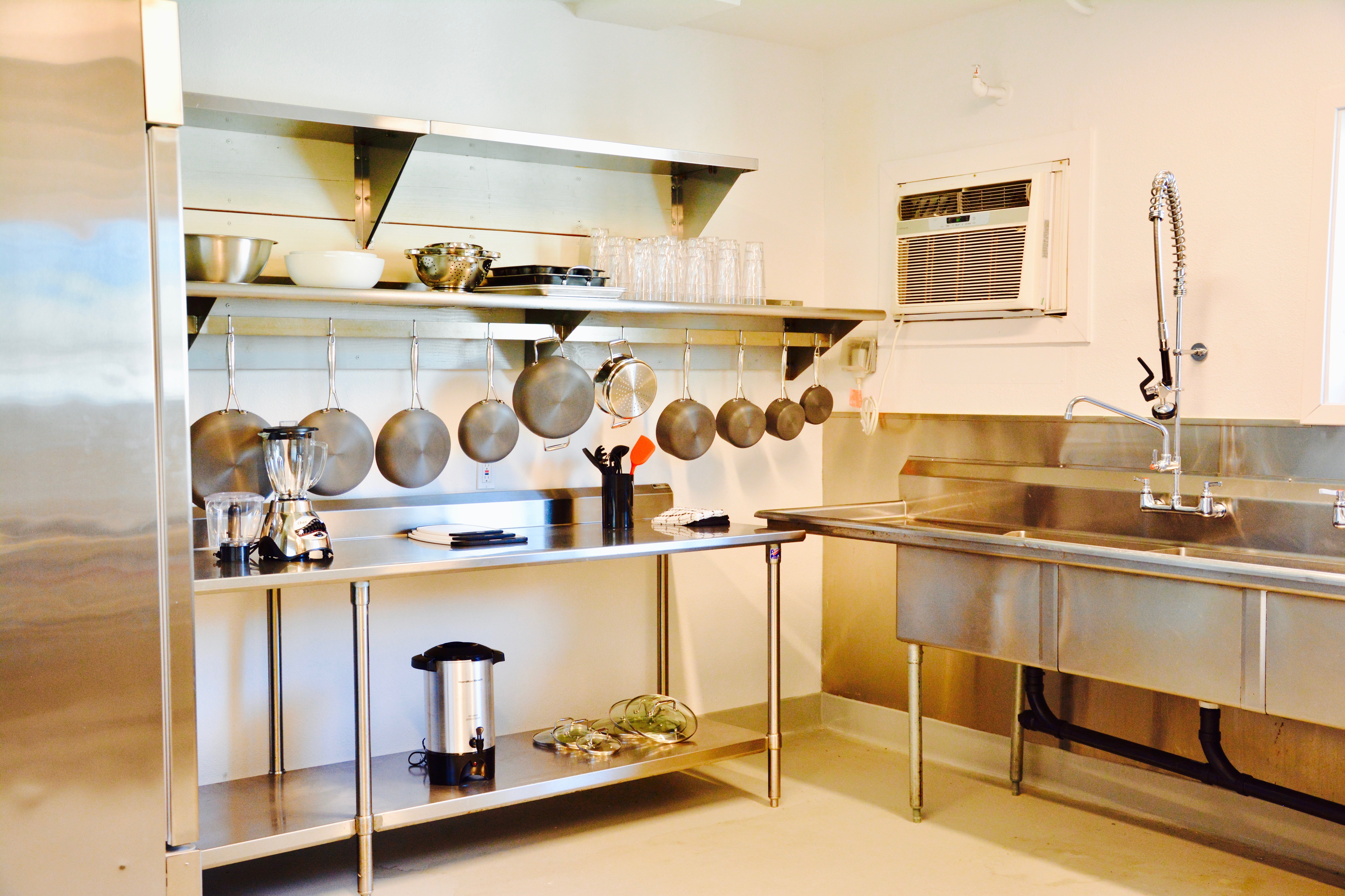 Commercial kitchen with stainless steel appliances