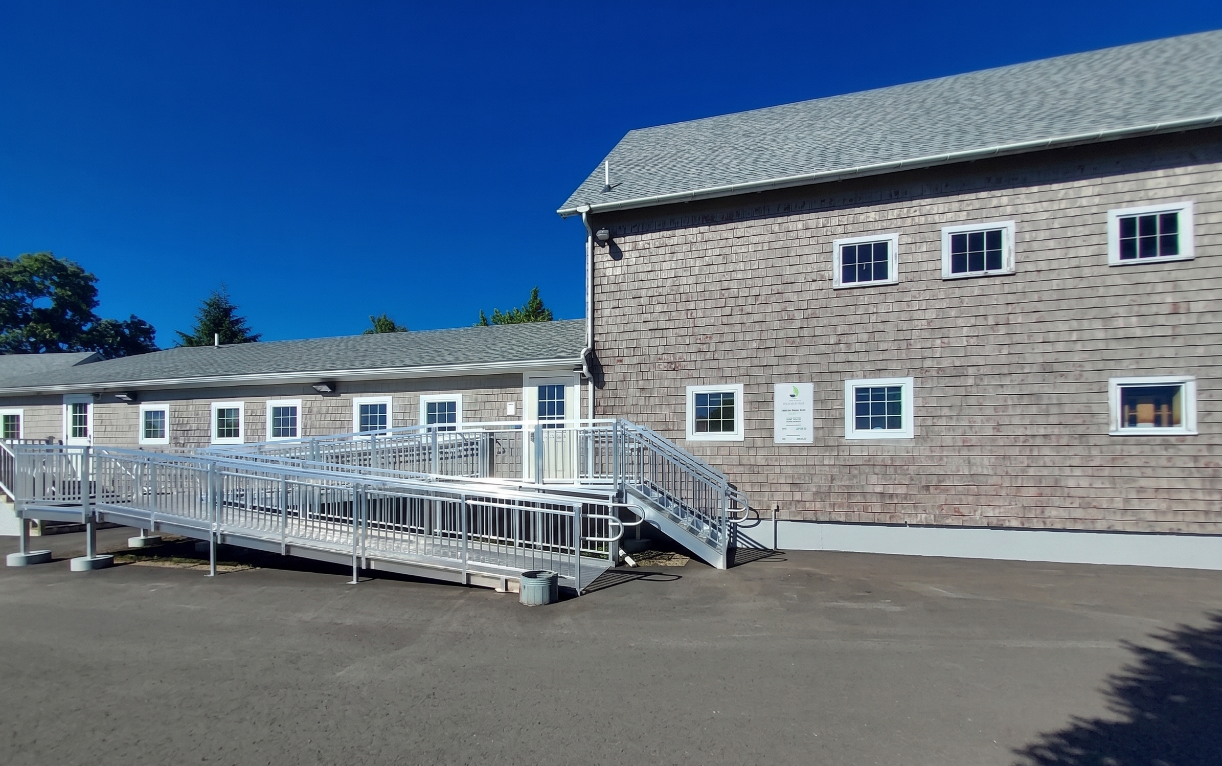 New Season facility exterior with long accessible entrance ramp