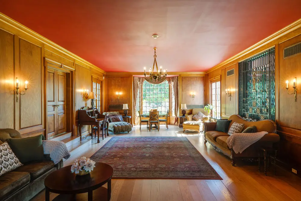 Elegant lounge with wood paneling and comfortable seating