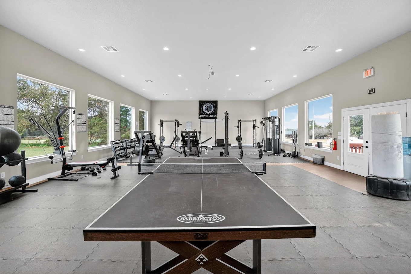 Recreation room with gym equipment and table tennis