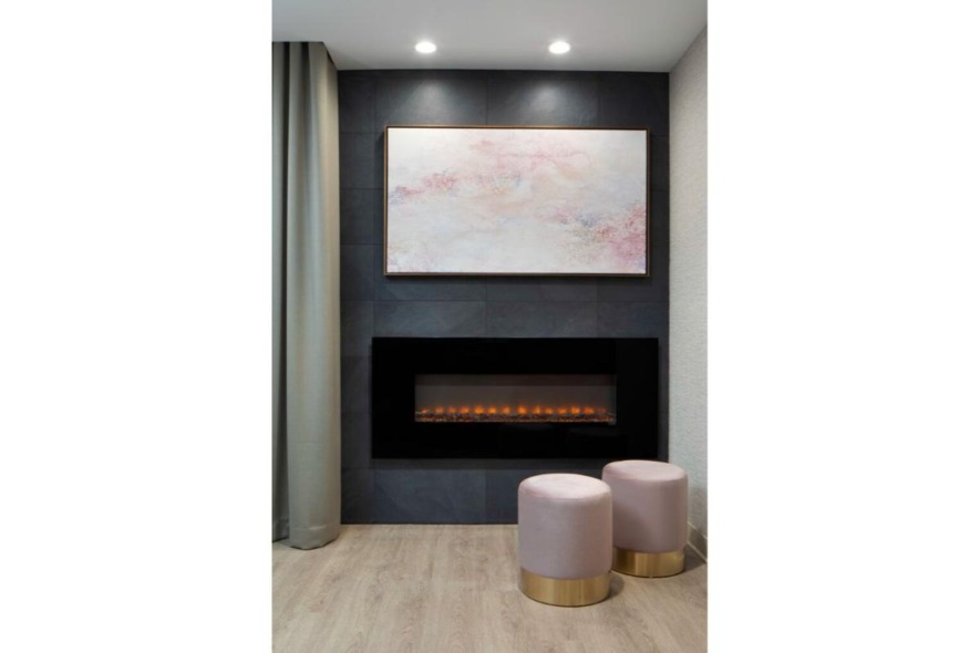 Quiet fireplace nook with seating and modern decor