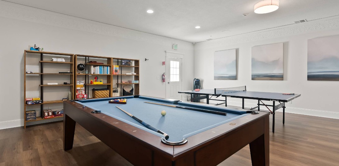 Game room with pool table and ping pong table