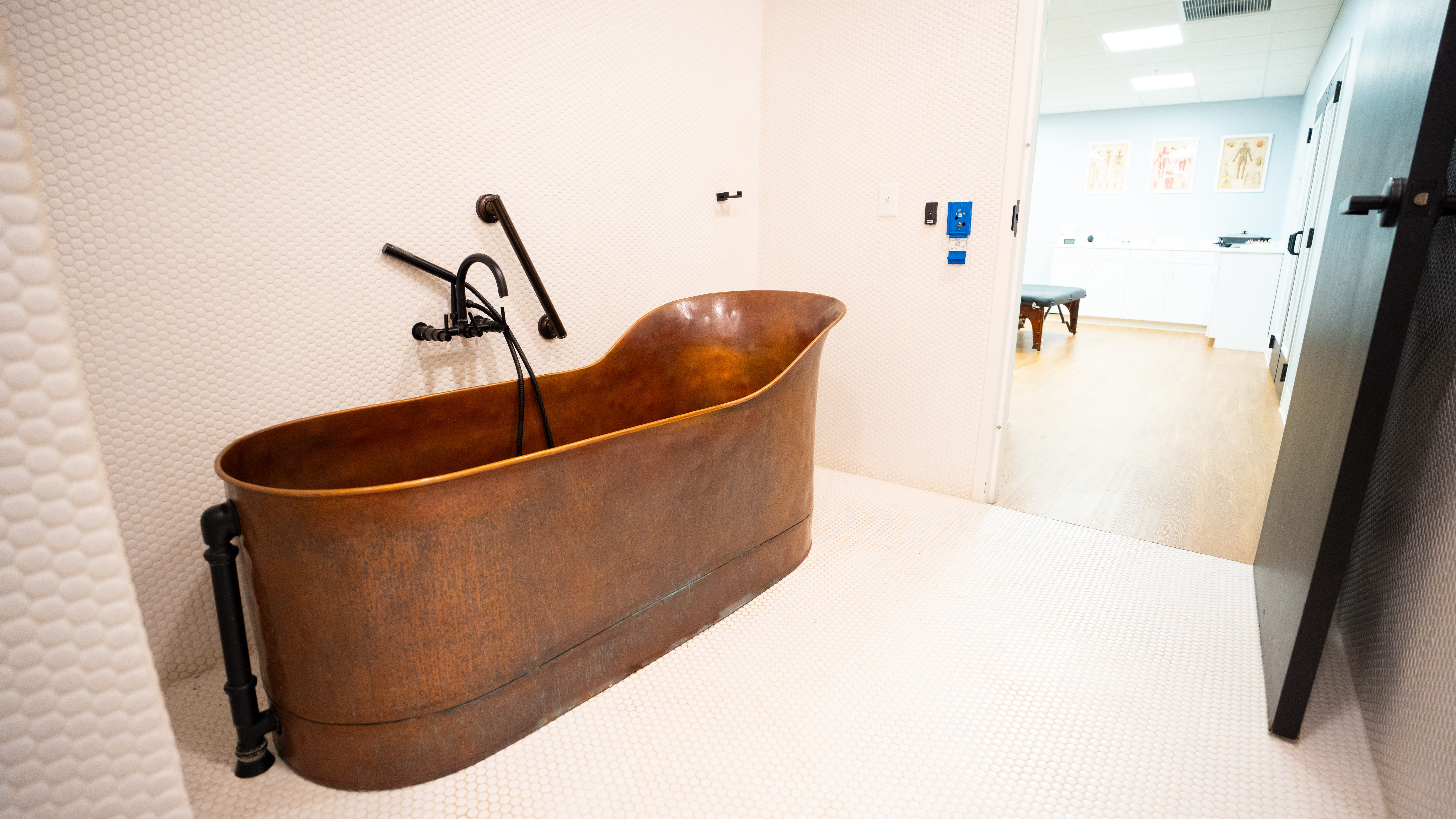 Copper soaking tub in a private spa room