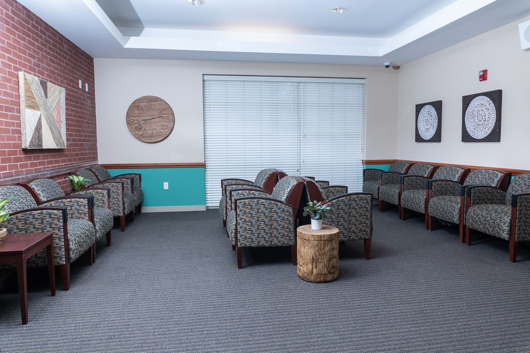 Waiting room with chairs arranged for group seating