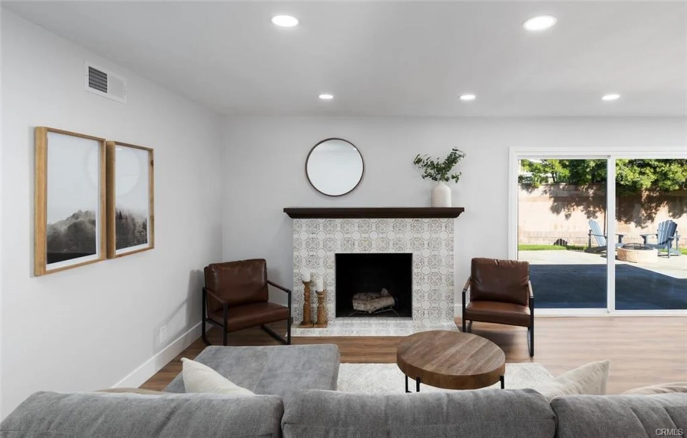 Cozy living room with fireplace and modern seating