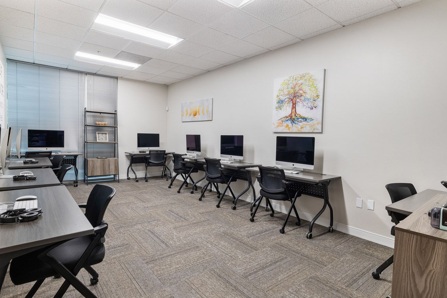 Computer room with desks and desktop computers