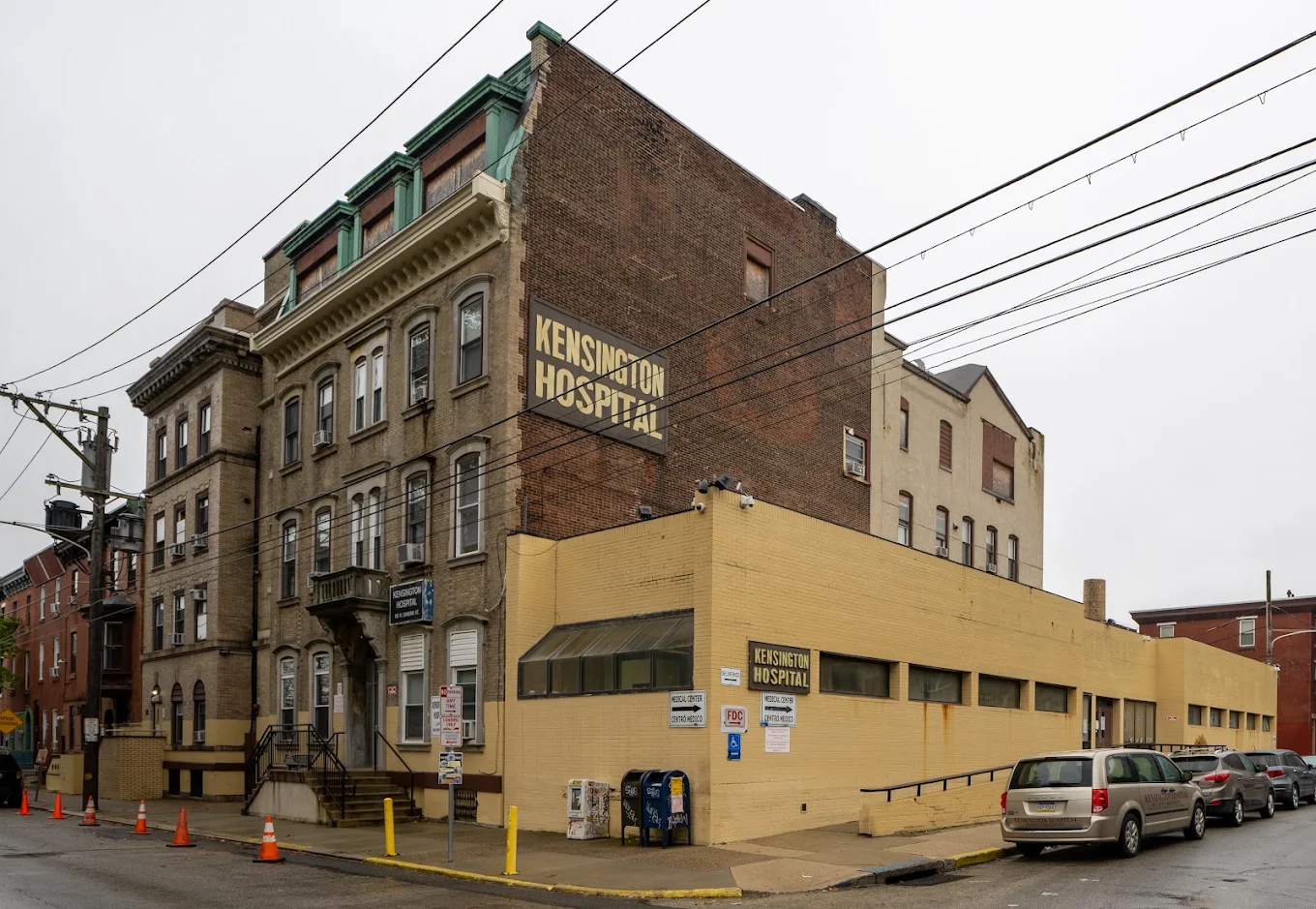 hospital exterior with branded brick wall