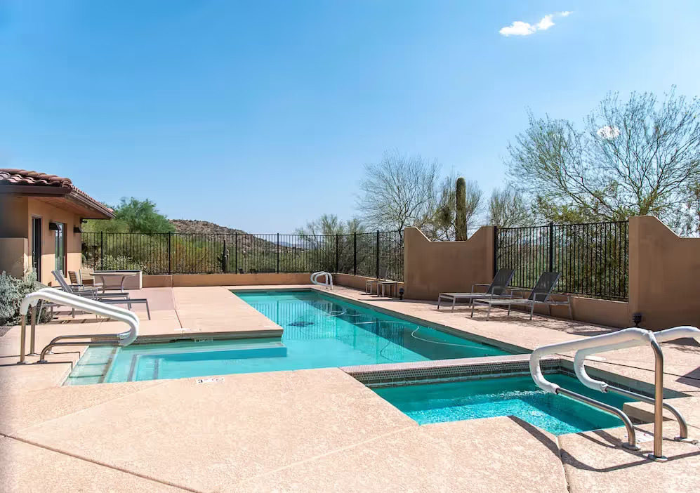 Rehab pool and hot tub with mountain views
