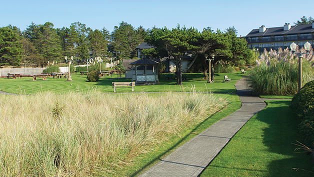 A peaceful outdoor setting with a gazebo and walking path.
