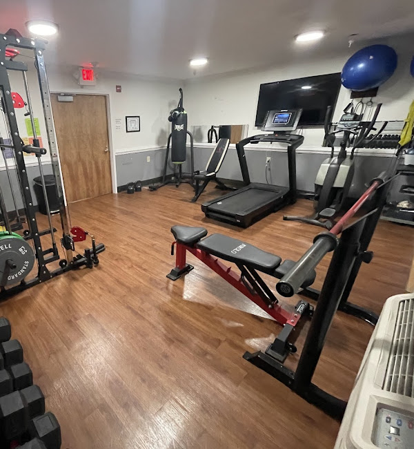 Fitness room with cardio and strength-training equipment