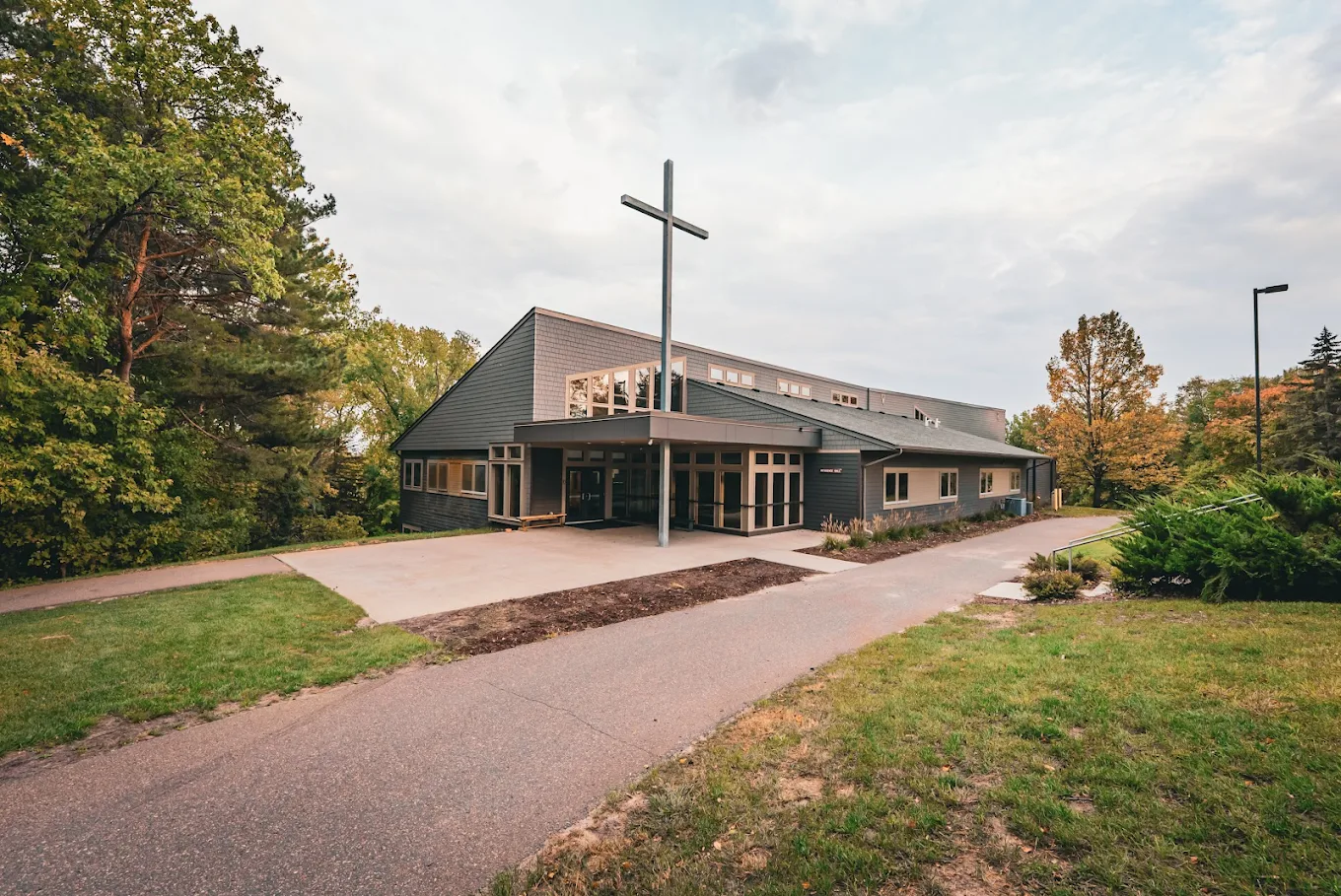 Main entrance to the treatment center surrounded by trees